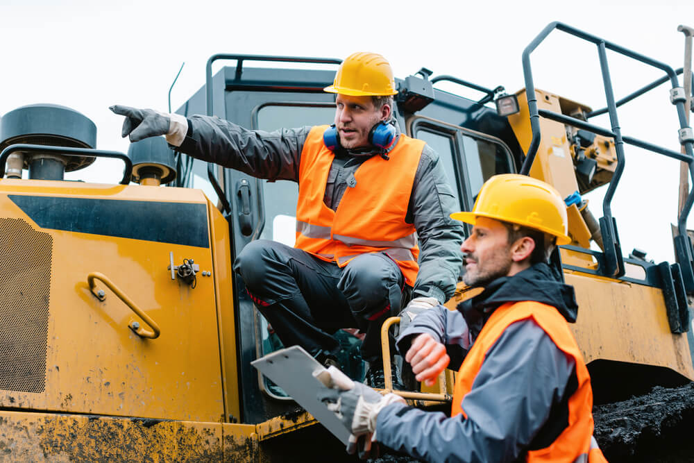 Asphalt workers talking